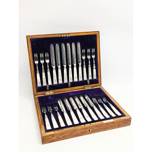 598A - Solid Sterling silver engraved set of 24 dessert forks and knives with Mother Of Pearl handles. Hall... 