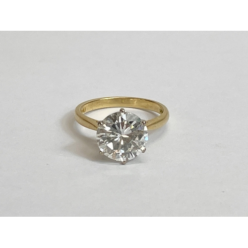 598E - An excellent quality 18ct gold single stone diamond ring. Round brilliant cut diamond calculated as ... 