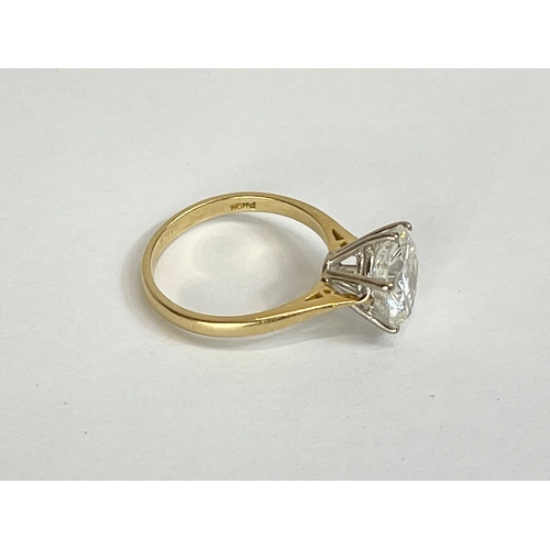 598E - An excellent quality 18ct gold single stone diamond ring. Round brilliant cut diamond calculated as ... 