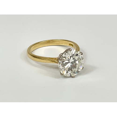 598E - An excellent quality 18ct gold single stone diamond ring. Round brilliant cut diamond calculated as ... 