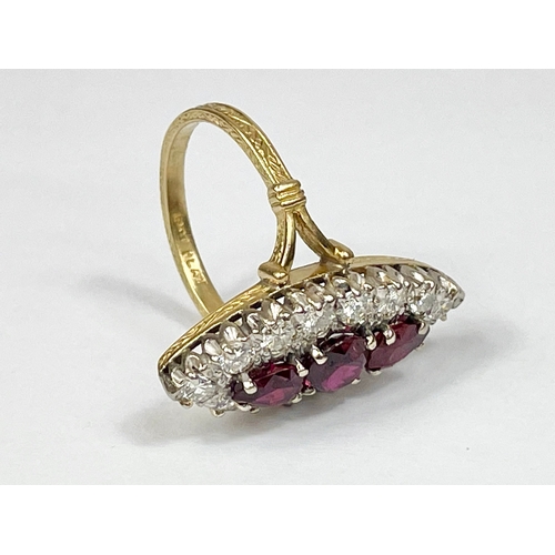 598D - An excellent quality 18ct platinum Ruby and Diamond ring with central round Ruby 6.2mm in diameter, ... 