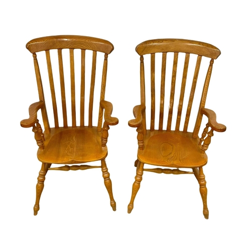 195I - A pair of large Victorian style Ash Country House armchairs.