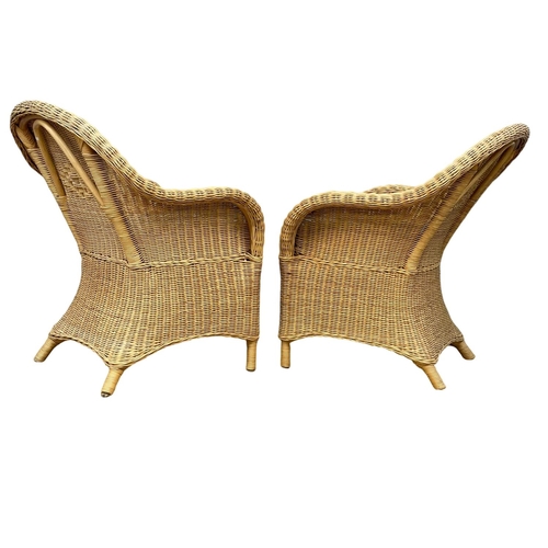 196M - A pair of Edwardian style wicker armchairs with glass top table. Chairs measure 68x60x89cm