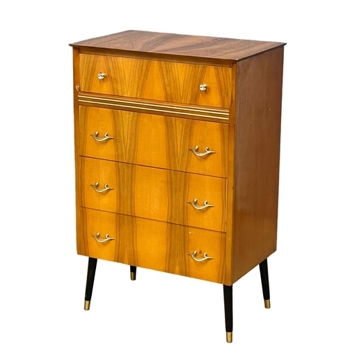 242 - A 1960’s Mid Century chest of drawers. 63x41.5x99cm