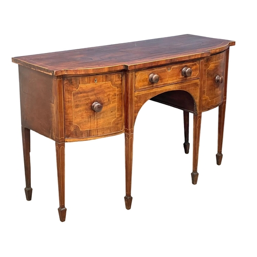 251 - A George III inlaid mahogany sideboard in the Sheraton style. Circa 1800. 152.5x60x94cm