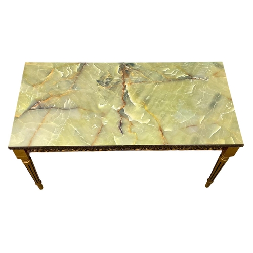 254 - An ornate coffee table with faux onyx top. 90x44x47cm