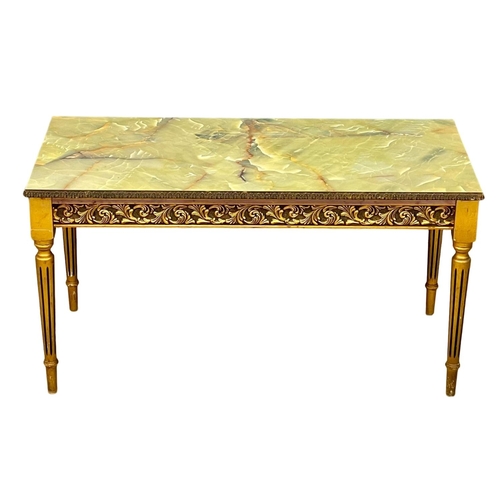 254 - An ornate coffee table with faux onyx top. 90x44x47cm