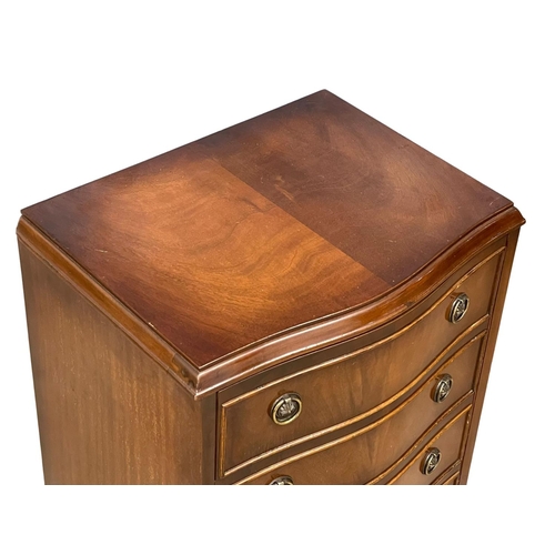 257 - A small Georgian style mahogany serpentine front chest of drawers. 48x36x65.5cm