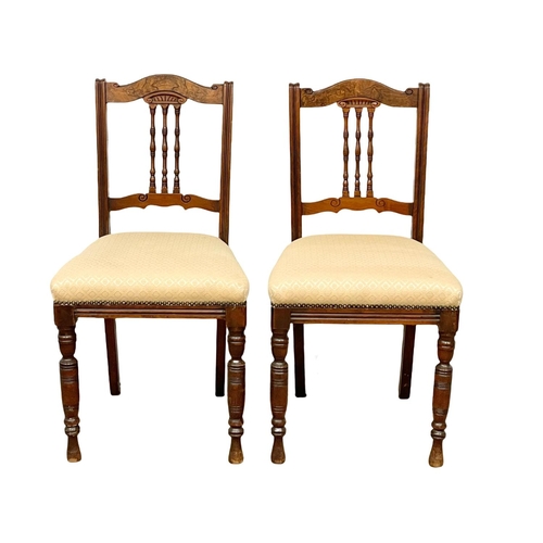 379M - A pair of late Victorian Walnut side chairs. Circa 1890.