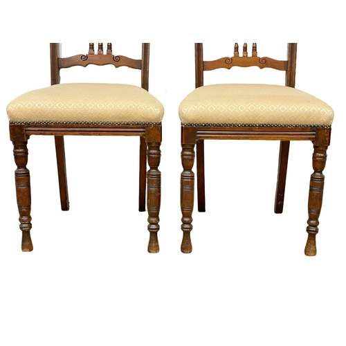 379M - A pair of late Victorian Walnut side chairs. Circa 1890.