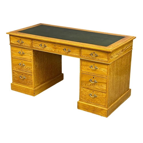 1080 - An early 20th century Georgian style simulated ash pedestal desk with leather top. Circa 1900-1910. ... 