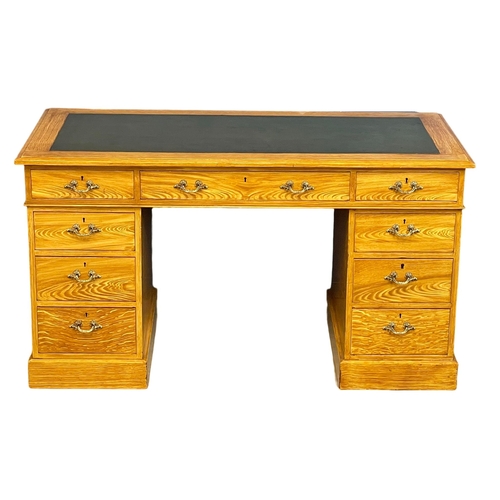 1080 - An early 20th century Georgian style simulated ash pedestal desk with leather top. Circa 1900-1910. ... 