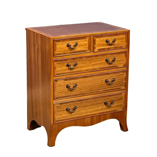 1081 - A small Georgian style inlaid mahogany chest of drawers of splayed feet. 61x38x73.5cm