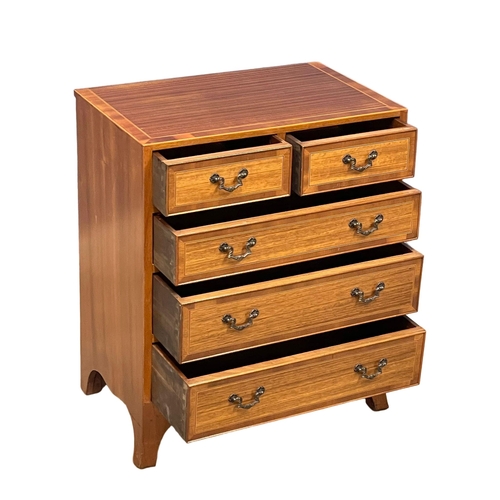 1081 - A small Georgian style inlaid mahogany chest of drawers of splayed feet. 61x38x73.5cm