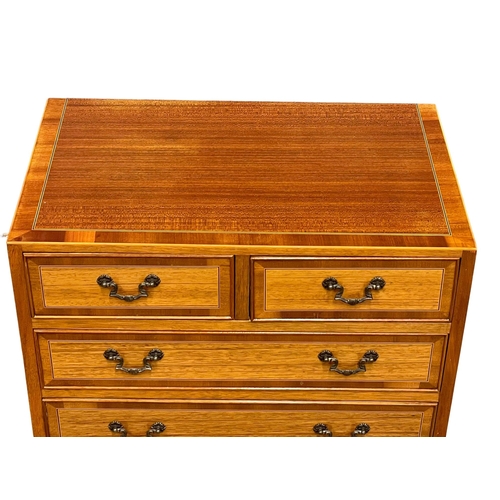 1081 - A small Georgian style inlaid mahogany chest of drawers of splayed feet. 61x38x73.5cm