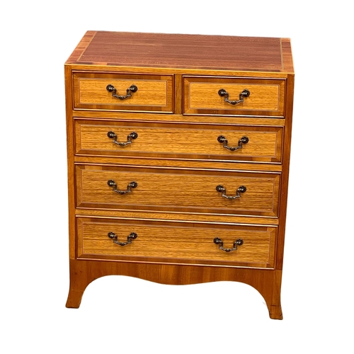 1081 - A small Georgian style inlaid mahogany chest of drawers of splayed feet. 61x38x73.5cm