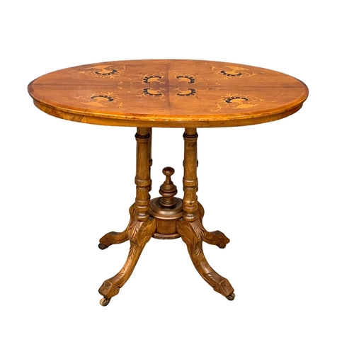 1082 - A Victorian inlaid mahogany pedestal table. 88x53x70cm