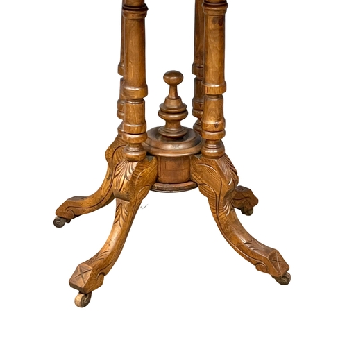 1082 - A Victorian inlaid mahogany pedestal table. 88x53x70cm