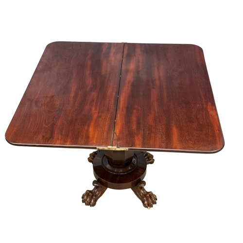 1094 - A William IV mahogany turnover tea table on paw feet. Circa 1830. 91x45.5x74cm