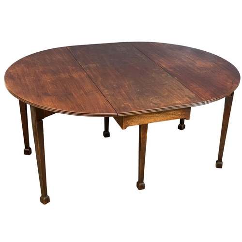 1097 - A large late George III mahogany drop leaf dining table, with 6 legs. Circa 1800-1820. Open 159x127x... 