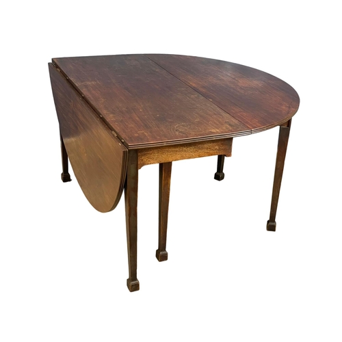 1097 - A large late George III mahogany drop leaf dining table, with 6 legs. Circa 1800-1820. Open 159x127x... 