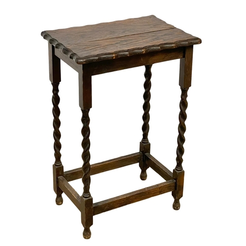 1099 - A 1920’s oak Barley Twist side table. 50x34x76cm