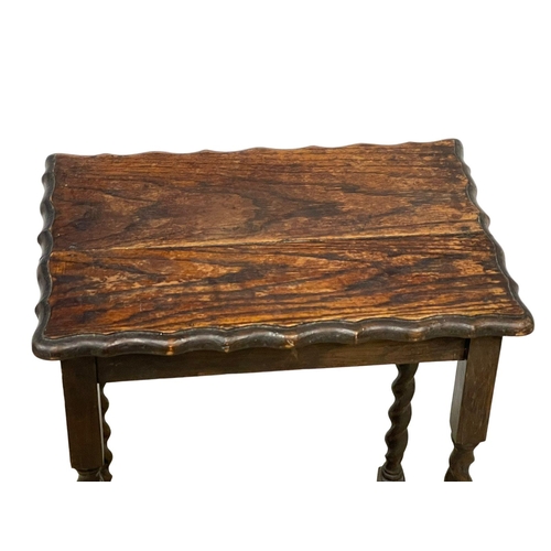 1099 - A 1920’s oak Barley Twist side table. 50x34x76cm