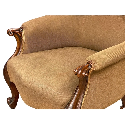 1100 - A large Victorian mahogany framed gents armchair on cabriole legs. 71x82x99cm.