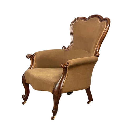 1100 - A large Victorian mahogany framed gents armchair on cabriole legs. 71x82x99cm.