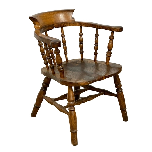 1106 - A Victorian Elm and Beech armchair.