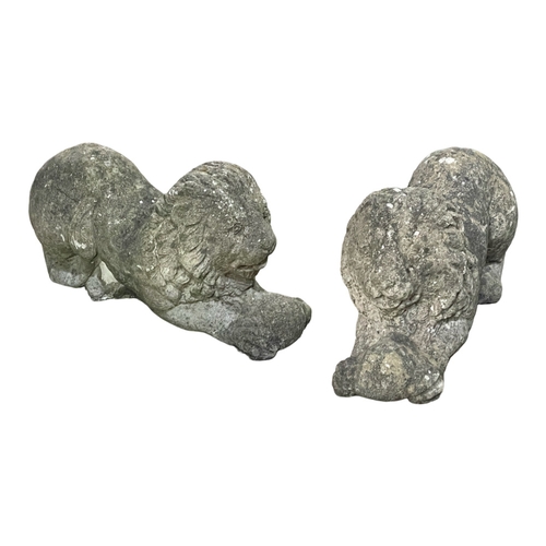 1114 - A pair of concrete garden lions. 52cm