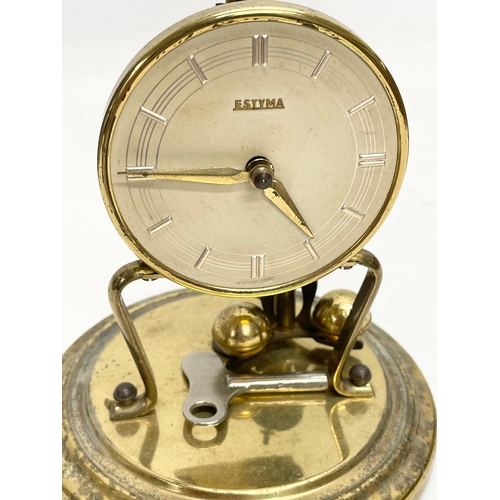 85 - 2 vintage brass 400 Day Anniversary clock with glass domes. Largest 33cm