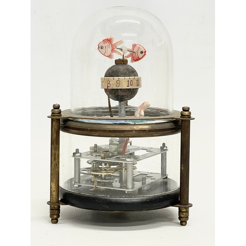 603 - A novelty clockwork automaton brass fish tank clock with glass dome. 15cm