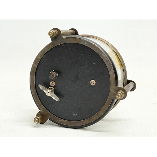 603 - A novelty clockwork automaton brass fish tank clock with glass dome. 15cm