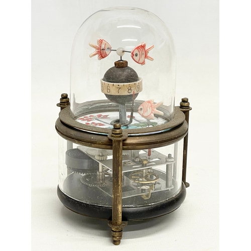 A novelty clockwork automaton brass fish tank clock with glass dome. 15cm