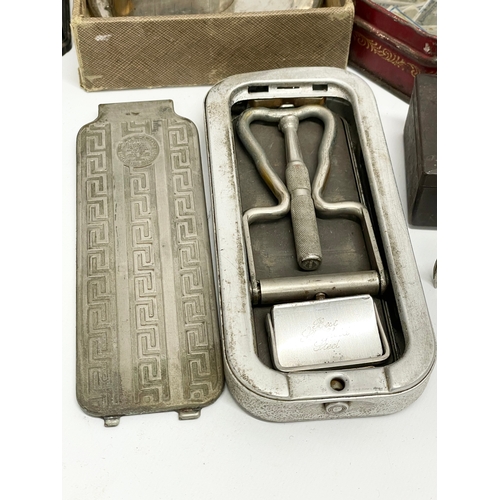 89 - A collection of vintage razors and blades etc.