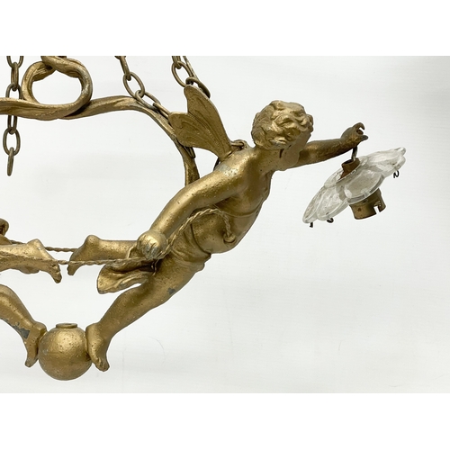 7 - A 3 piece early 20th century cherub spelter light fitting. Circa 1900-1910. Largest piece 50x41cm