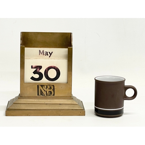 8 - A 1920’s Art Deco bronze desktop calendar. 16x8x17cm