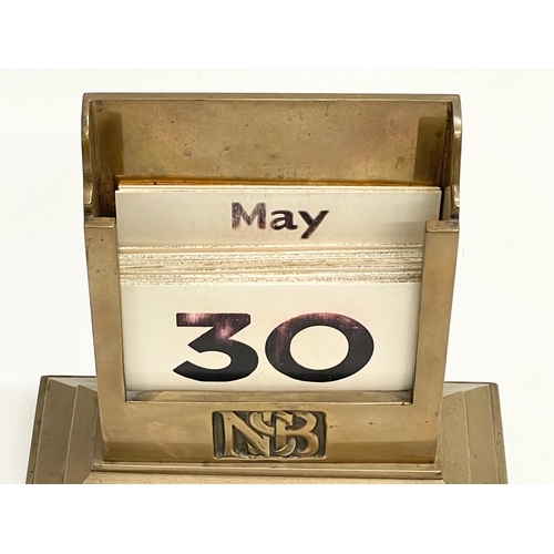 8 - A 1920’s Art Deco bronze desktop calendar. 16x8x17cm