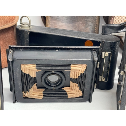 106 - A collection of vintage cameras, Brownie’s etc. including a Six-20 ‘Brownie’ C by Kodak, a Coronet T... 