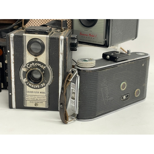 106 - A collection of vintage cameras, Brownie’s etc. including a Six-20 ‘Brownie’ C by Kodak, a Coronet T... 