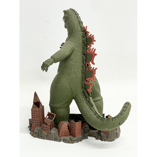 167 - An Aurora 1964 ‘Godzilla’ painted model kit figure. 20x22cm