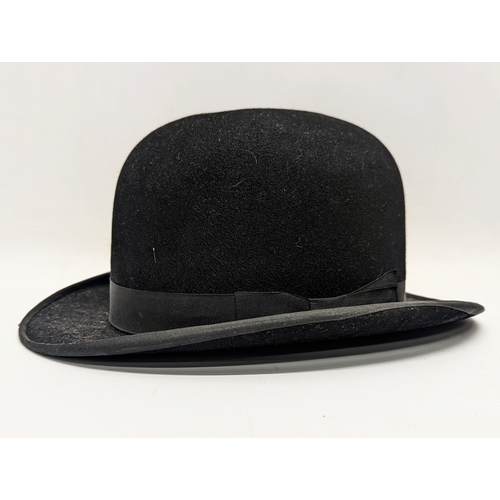 129 - A vintage satin lined bowler hat, London Style. Feather weight.