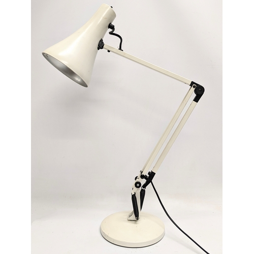 128 - A Mid Century anglepoise lamp, by Genuine Anglepoise, England.