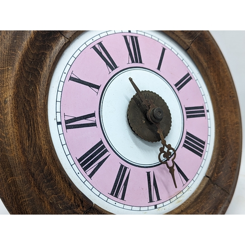 116 - A late Victorian Postmans wall clock. 27cm