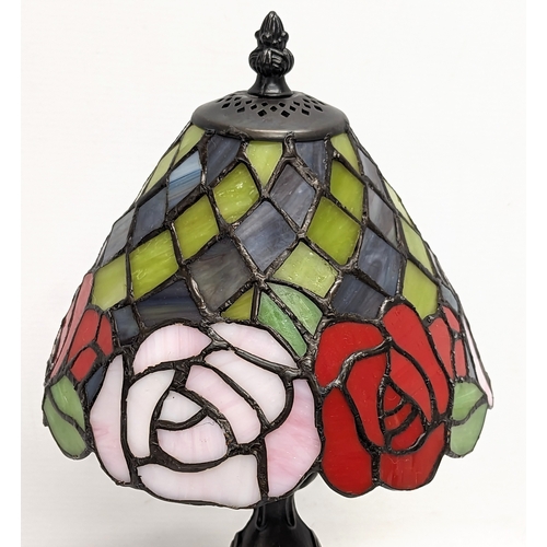 119 - A Tiffany style table lamp. 35cm