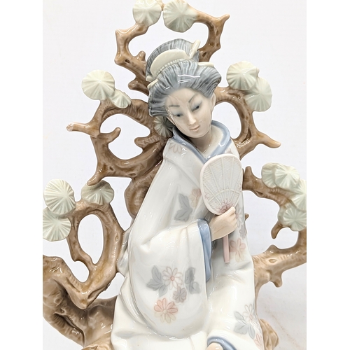 652 - A large Lladro figure. 31cm