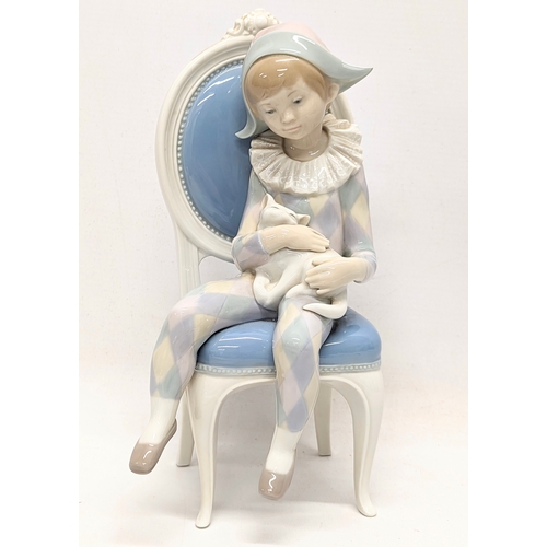 653 - A Lladro pottery figure, 