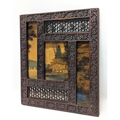 141 - A late 19th / early 20th century Japanese linen and carved wooden frame. 33x38cm