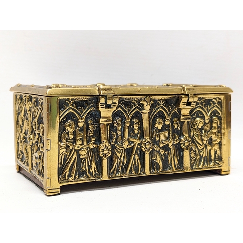 13 - A late 19th century ornate brass trinket box depicting medieval gothic figures. 15x9.5x7cm